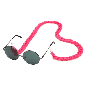 Detail of round sunglasses with vibrant pink acrylic chunky chain and black metal frame