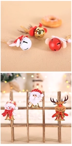 Detail of Santa, Snowman and Reindeer doll pendants with colorful metal bells