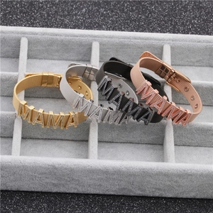 Detail of adjustable mesh watch straps in gold, silver, black and rose gold with MAMA letters