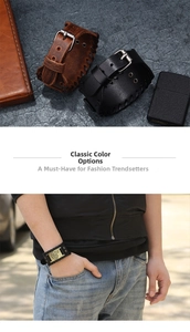 Detail of adjustable leather wristband featuring a vintage metal wolf head plaque