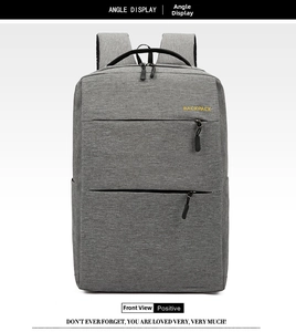 Detailed macro view of the grey water-resistant oxford fabric and dual-zipper compartment