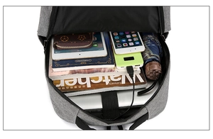Top view showing internal spacious compartments of grey oxford waterproof business backpack
