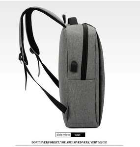 Side view of gray waterproof business backpack featuring external USB charging port