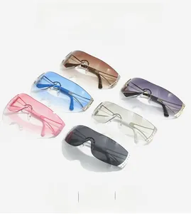 Close-up of frameless wrap-around Y2K sunglasses with sparkling rhinestones in various colors
