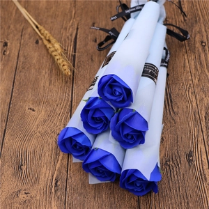 Detail of 7 pieces of blue soap roses wrapped in paper with Happy Everyday ribbons