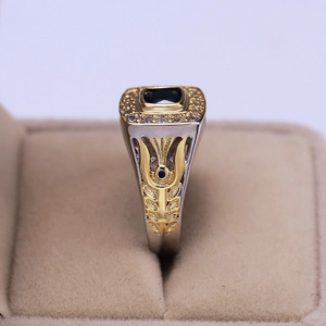 Retro two-tone men's ring with central blue gemstone and white zircon accents