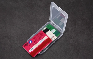 Macro view of translucent PP card holder showing flat flip-top design and storage capacity