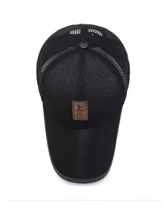 Top view of a breathable black mesh baseball cap with a brown leather EDIKO patch