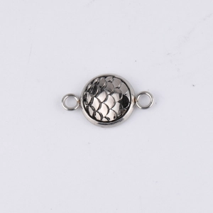 Macro view of 10mm stainless steel fish scale texture pendant with double loops
