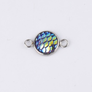 Macro view of 10mm stainless steel pendant with blue fish scale pattern and dual rings