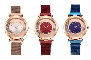 Modern quartz women's watches featuring diamond bezels and Milanese magnetic mesh bands