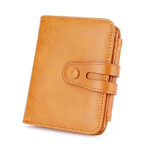 Close-up of brown leather RFID long wallet featuring snap button and pen holder slot