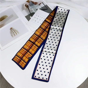 Double-sided twilly scarf featuring yellow plaid and blue polka dots on white background