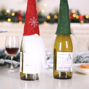 Nordic Gnome Christmas wine bottle covers with red snowflake felt hats and white faux fur beard