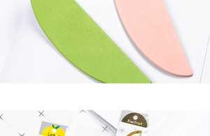 Close-up of wooden fruit rulers in lemon and kiwifruit packaging for student stationery