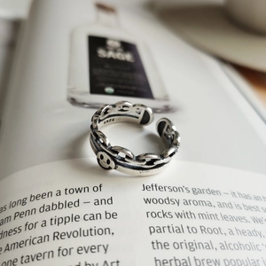 Detail of S925 sterling silver stamp on vintage smiley face Cuban chain ring