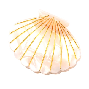 Elegant shell-shaped acetic acid hair claw with pearlescent finish and gold accents