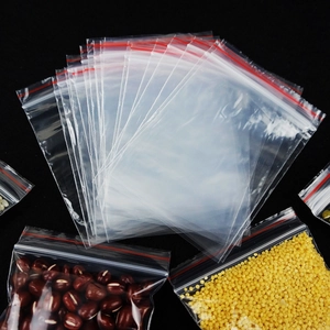 Close-up of transparent PE poly bags with red zipper seals showing food storage capability