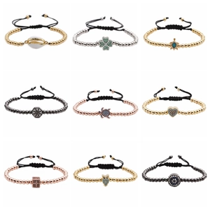 Collezione di braccialetti brasiliani con ciondoli a occhio, trifoglio e tartaruga colorati