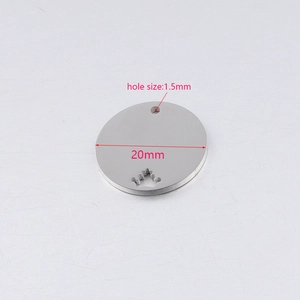 Macro view of 20mm stainless steel round tag with hollow crown and size dimensions