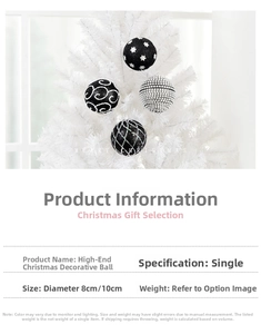 Detail of 8cm black and white painted Christmas ball ornaments with glitter on tree