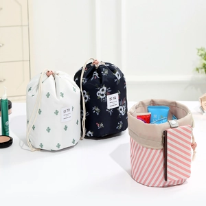 Oxford fabric cylindrical drawstring makeup bags in cactus, floral, and striped patterns