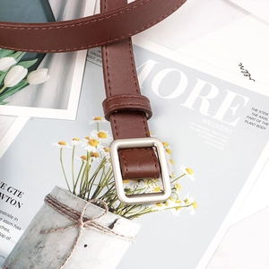 Minimalist dark brown leather belt for women featuring a brushed silver square buckle