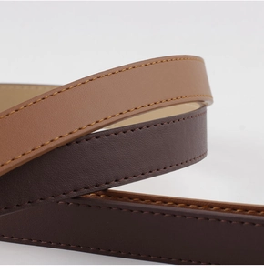 Detailed close-up of premium leather belt stitching in light and dark brown finishes