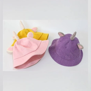 Kids corduroy unicorn sun hats in pink, yellow and purple with 3D horns and ears