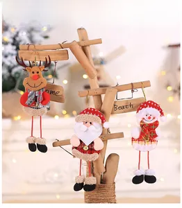 Detailed view of Christmas doll hangers featuring reindeer, Santa and snowman figures