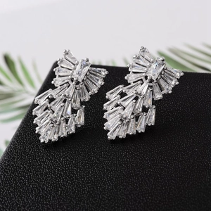 Elegant silver earrings with AAA cubic zirconia in a layered radiant sunburst design
