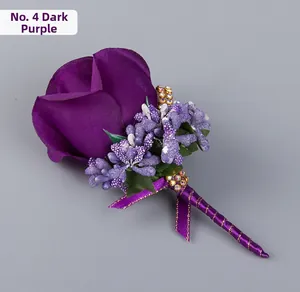 Detail of dark purple faux rose boutonniere with gold pearls and purple satin ribbon wrap