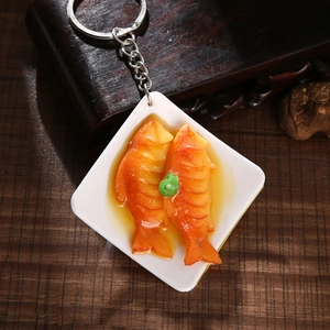 Creative resin keychain featuring realistic braised fish miniature on white tray with ring