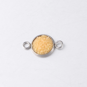 Detail of 10mm stainless steel drusy connector with yellow resin and double rings