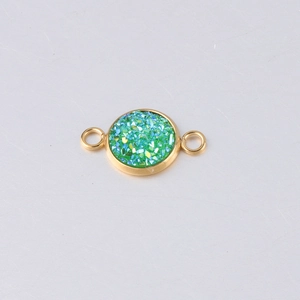 Detail of 10mm gold-plated stainless steel connector with sparkling green glitter inlay