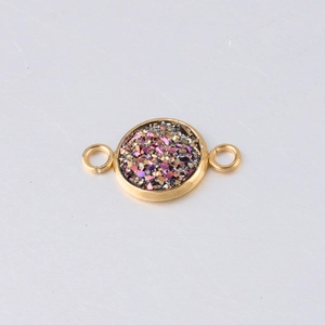 Detailed view of 10mm gold vacuum plated stainless steel star pendant with double loops