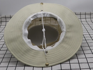 Detail of outdoor sun hat featuring breathable mesh lining and adjustable chin strap