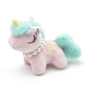 Pink plush unicorn toy with mint green mane and pearl necklace on a white background