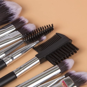 Detail of professional makeup brushes with soft gradient bristles and silver ferrule finish