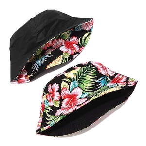 Reversible bucket hat with floral print and black side for outdoor summer travel