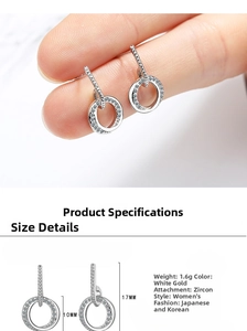 Macro detail of platinum-plated silver hoop earrings with cubic zirconia inlay 17mm