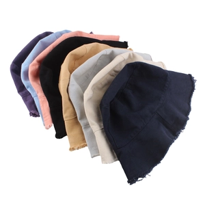 Frayed edge cotton bucket hats for women in multiple colors with washed canvas texture