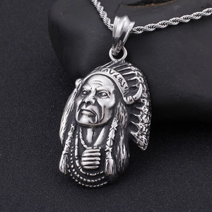 Ethnic retro silver Indian chief head pendant necklace with rope chain on dark stone