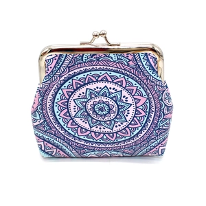 Detail of bohemian mandala coin purse with pink geometric patterns and metal kiss lock