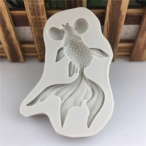 Macro detail of white silicone koi fish mold showing intricate scales and fin textures