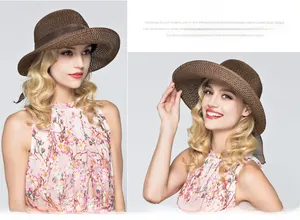 Detail of dark brown breathable hollow straw hat with a stylish satin ribbon band