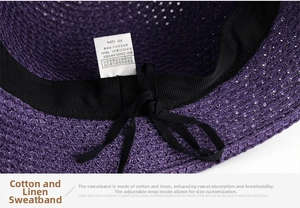 Detail of adjustable inner sweatband with drawstring inside purple woven straw sun hat