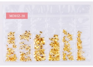 Detailed view of MDHZ-20 6-slot package with gold geometric metal nail art studs