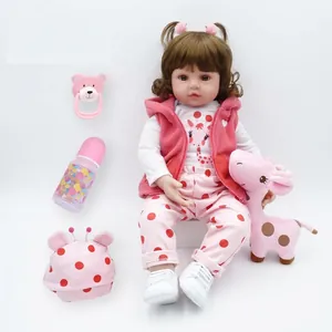 Reborn baby doll 47cm in pink outfit with plush giraffe toy and feeding accessories