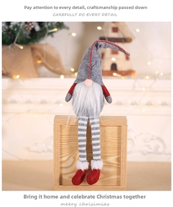 Detail of Christmas gnome with long striped legs, grey pointed hat, and white beard decor